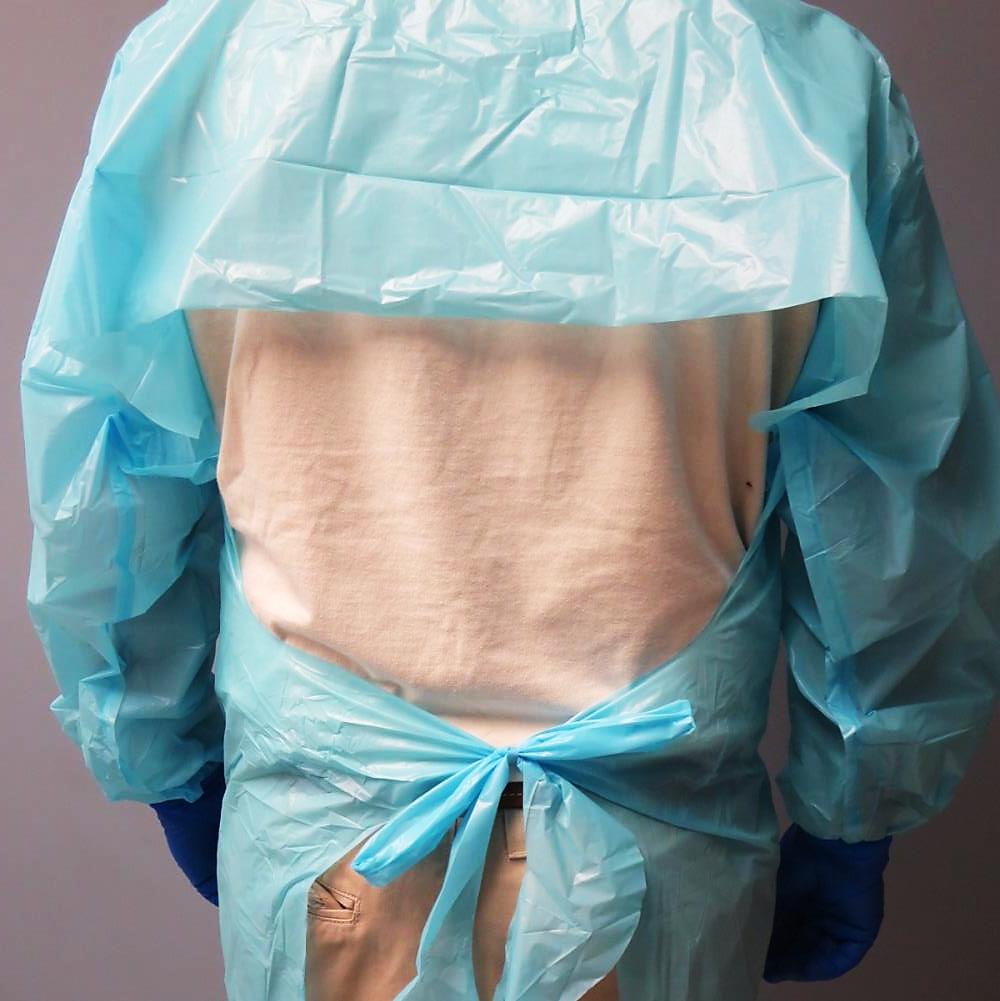 Disposable 1.25-mil Blue Embossed Polyethylene Apron Style Isolation Gowns with Thumb-Loops